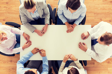 close up of business team sitting at table