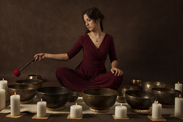 Woman playing Tibetan bowls