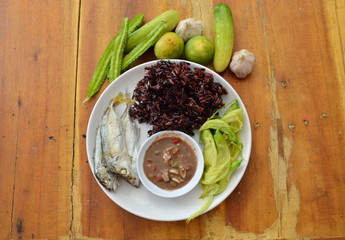black sticky rice eat with steam mackerel and shrimp paste sauce