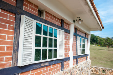 Window on a red brick wall
