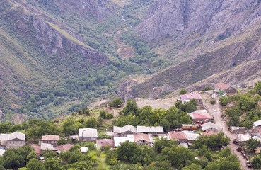 Mountain landscape. The landscape in Armenia (Tatev). A small village in the mountains.