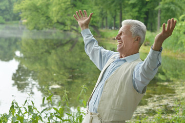 happy elderly man outdoors
