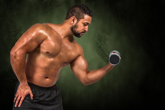 Composite image of muscular man lifting heavy dumbbell 