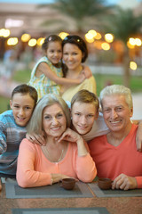 Family relaxing at resort