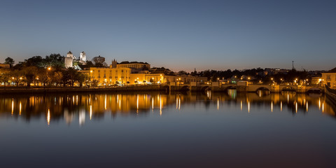 Obraz premium Evening Night panorama of the city of Tavira. Portugal, Algarve.
