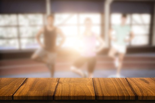 Composite Image Of Fitness Class On Bosu Balls