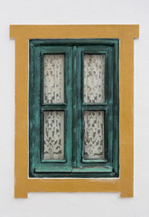 Traditional window of Portuguese homes. Green colour.