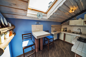 Kitchen in country style . Penthouse