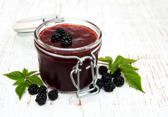 Blackberry jam and fresh blackberries