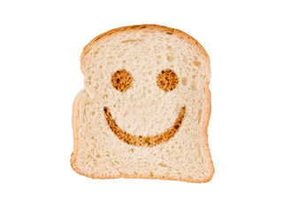 A smile toasted on a slice of bread, isolated on white background