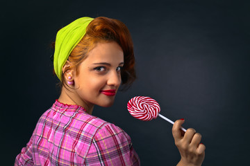young beautiful woman with candy