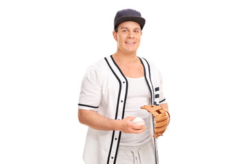 Young man holding a baseball