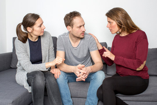 Three persons having an argument