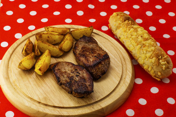 Grilled steaks with fried potato