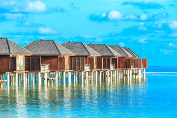  beach with water bungalows Maldives