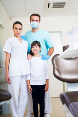 Dentist Team with a little girl.