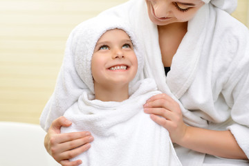 Mother and daughter in the bath room 