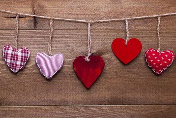 Red Hearts Hanging In A Line For Valentines Daecoration