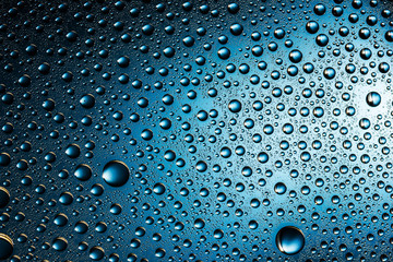 Water drops on glass surface texture.