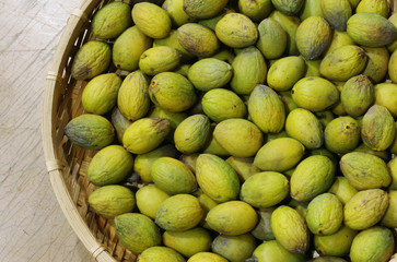 olive fruit in wood basket