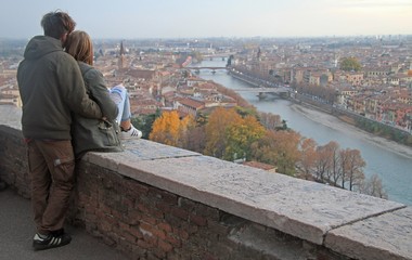 loving couple against the background of cityscape, Verona - 99246355