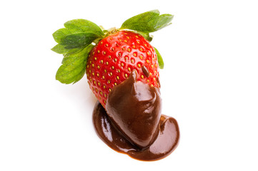 strawberry in chocolate over white background