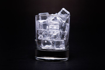 Ice cubes in glass vintage tone
