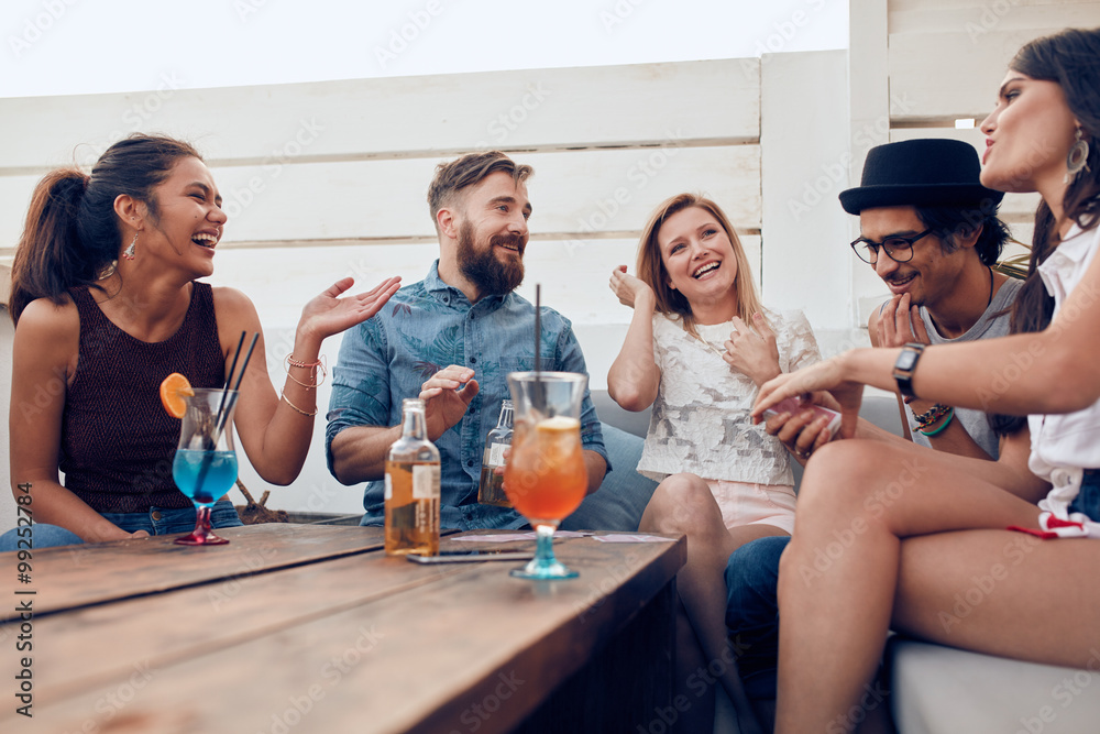 Wall mural happy young friends enjoying at a party