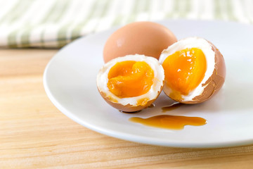 Fototapeta premium half medium-boiled eggs in Japanese Bowl