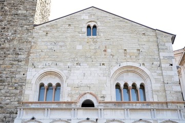 Fototapeta na wymiar Medieval architecture facade. The oldest public building in the city. Brescia, Italy.