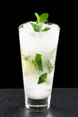 Mojito cocktail on black background