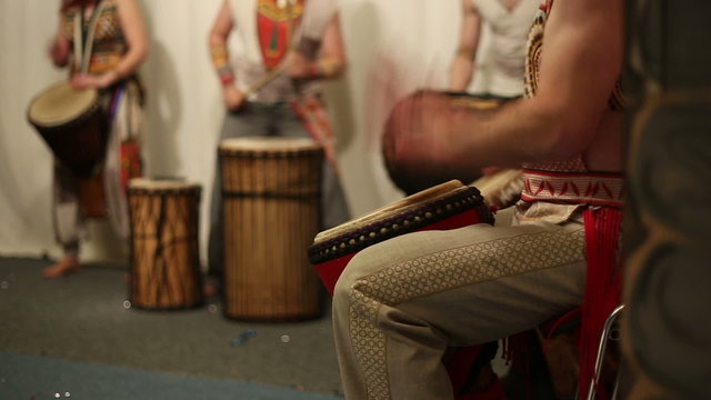Musical group plays ethnic drums djembe, master class professional

