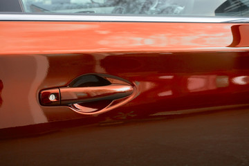 Obraz na płótnie Canvas red car door handle