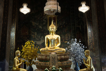 Phraputtumwicheshatthada the golden ancient sitting Buddha in church . Located in Wat Prayurawongsawas Worawihan temple ,Thonburi District, Bangkok city, Thailand.