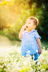 Happy time of little asian boy in the park