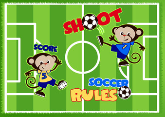 Soccer monkeys playing on a green sports field