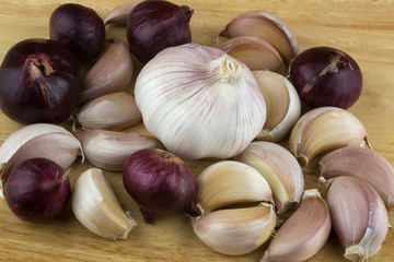 Garlic and Shallots on Chopping Board