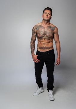 shirtless tattoed man