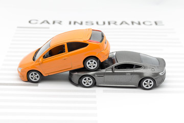 Accident toy car with insurance concept