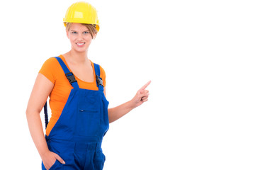 frau vom bau zeigt auf werbetafel