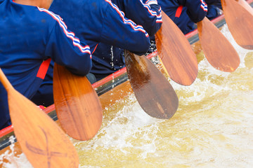 Close up of rowing team race