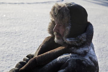 mature man in the background winter nature