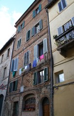 Fototapeta na wymiar Facades of buildings in Siena, Italy