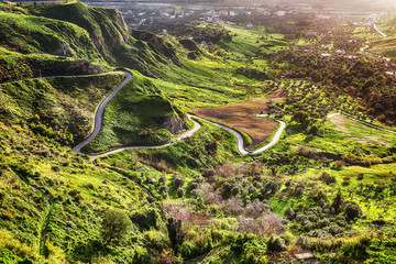 HDR Green Background of a Mountain with a Street