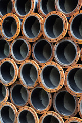 Stacked steel pipe industrial texture background vertical