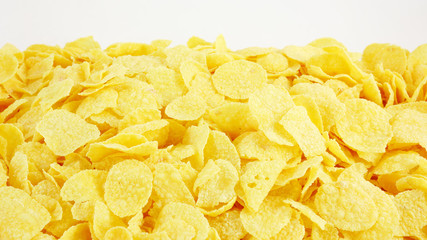 The close up of tasty golden corn flakes.
