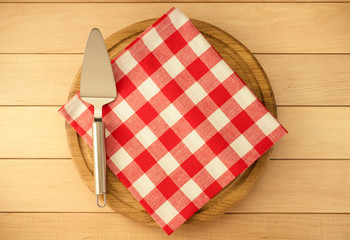 napkin at cutting board on wood