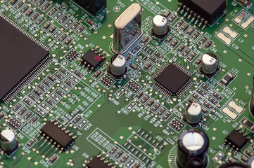 Circuit board with electronic components. Computer and networking communication technology concept.