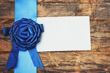 holiday background with blue ribbon