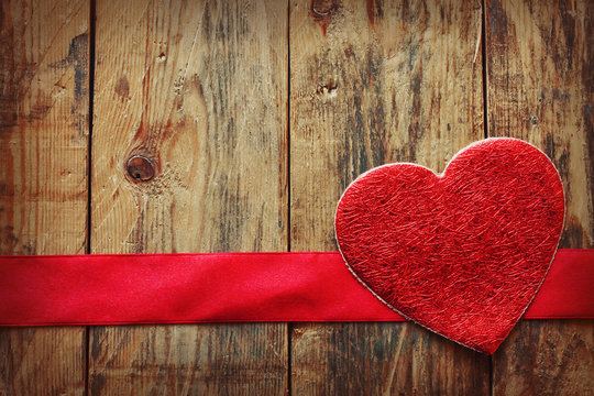 valentine's day background with heart and red ribbon